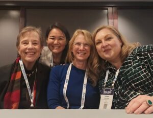 Four DPEN team members shoulder-to-shoulder at GSA